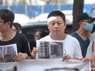 天津爆炸事故后 律师称“受损房屋”房贷照还